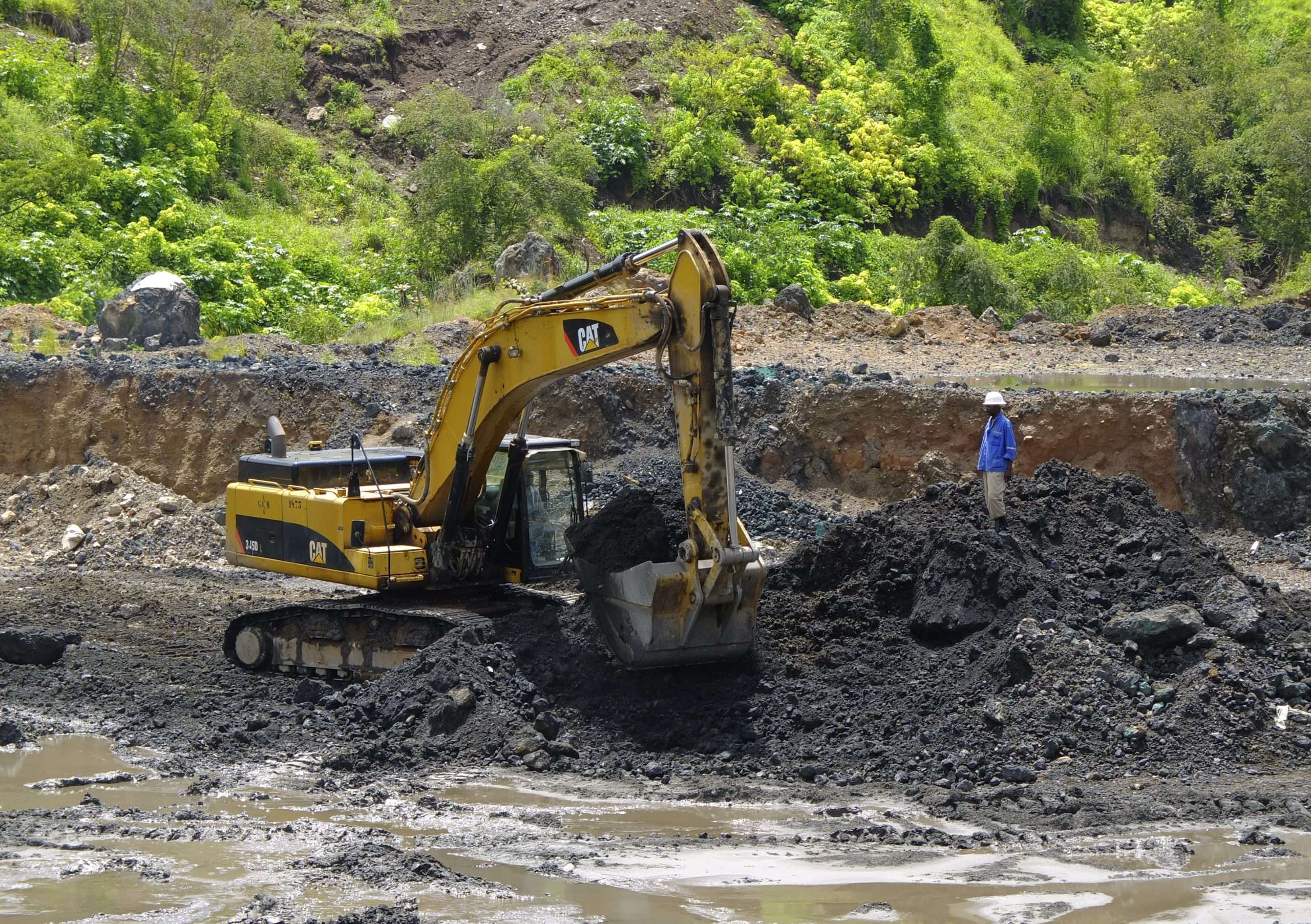 Excavator is used at the bottom of Congolese state mining company Gecamines' Kamfundwa open pit copper mine